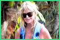 Goldie Hawn Rocks a Red Swimsuit at Age 67, Feeds Dolphins With Kurt Russell